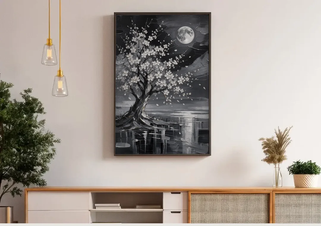 Cherry Blossom Night Painting Under Full Moon canvas wall art above a wooden sideboard under pendant lights