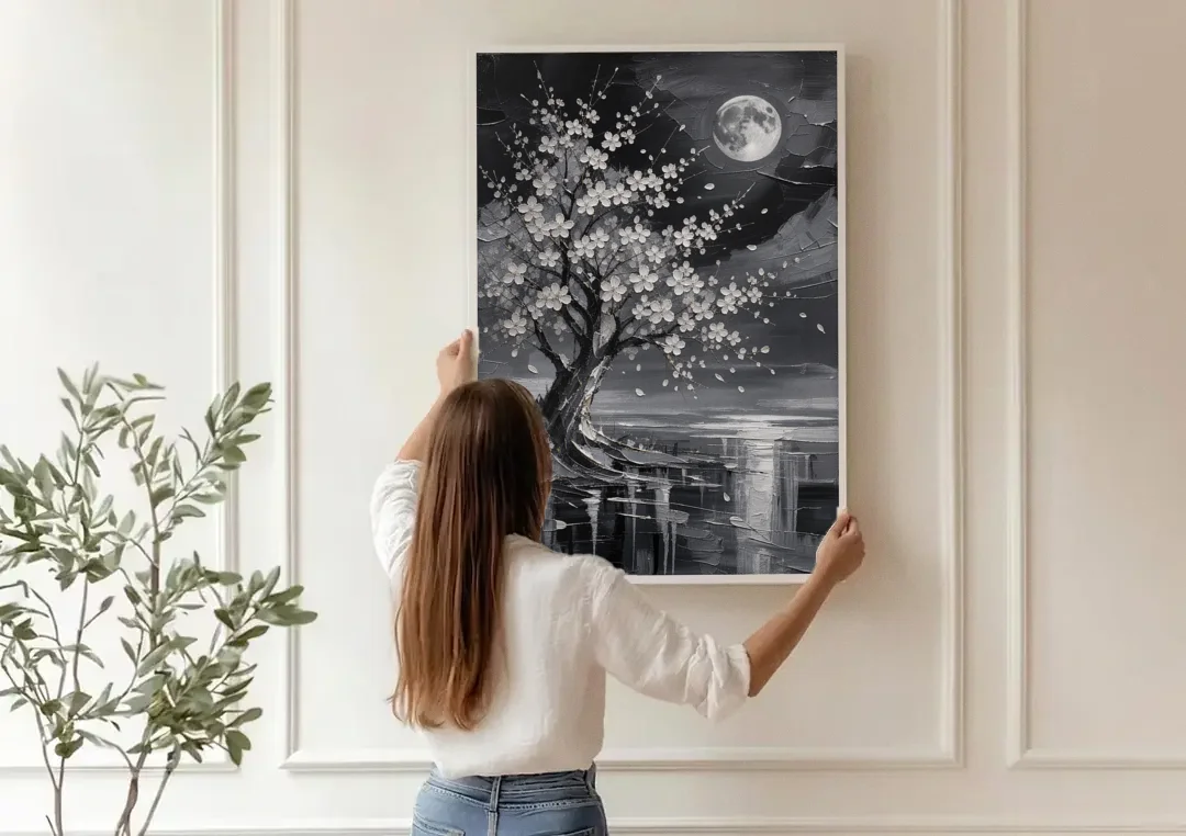 Cherry Blossom Night Painting Under Full Moon canvas wall art being hung on a paneled wall