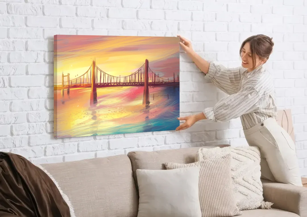Chesapeake Bay Bridge Reflections canvas wall art being hung on a white brick wall above a sofa