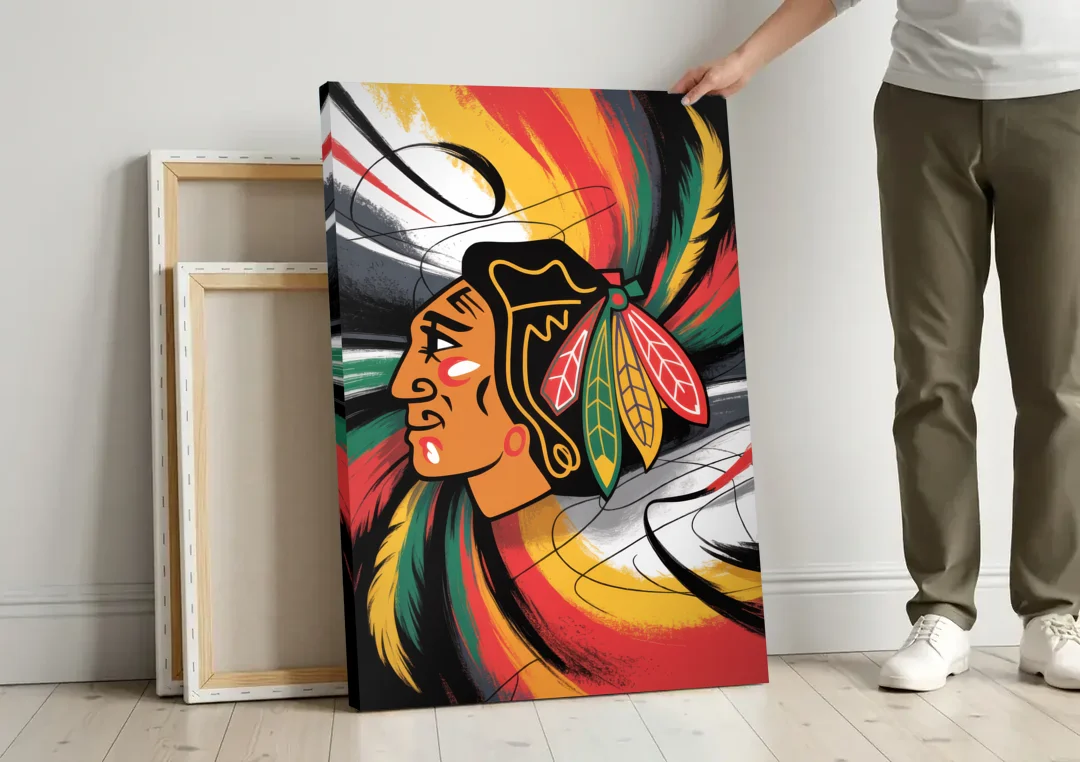 Chicago Blackhawks Dynamic Abstract Art Hockey and Feathers canvas wall art leaning against a wall next to blank canvases