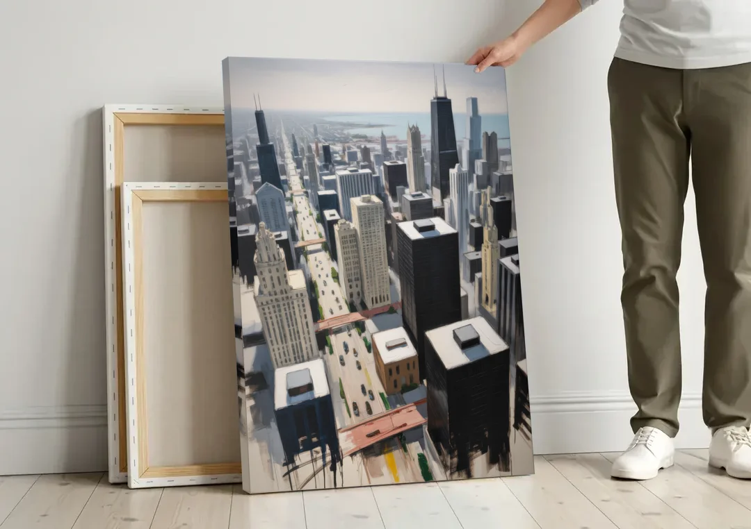 Chicago Downtown Black & White canvas wall art leaning against a wall next to blank canvases