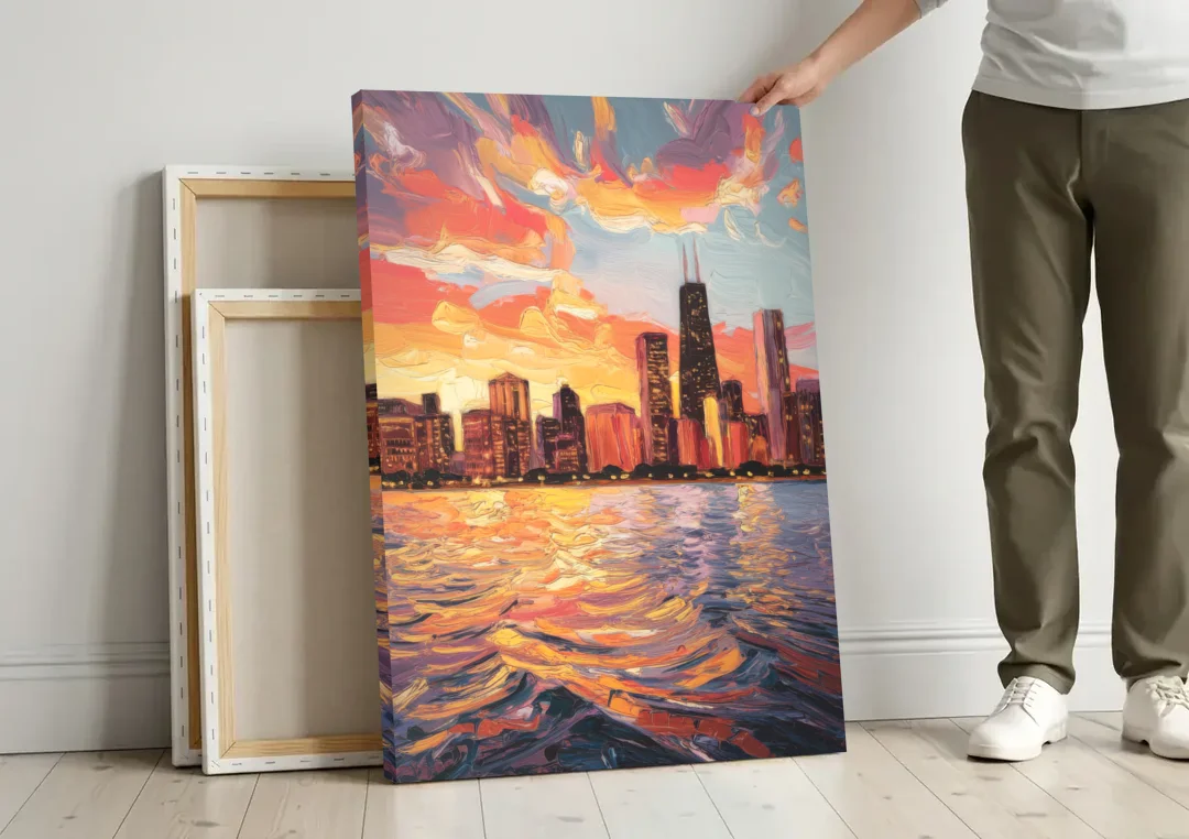 Chicago Sunset Over the Lake canvas wall art leaning against a wall next to blank canvases