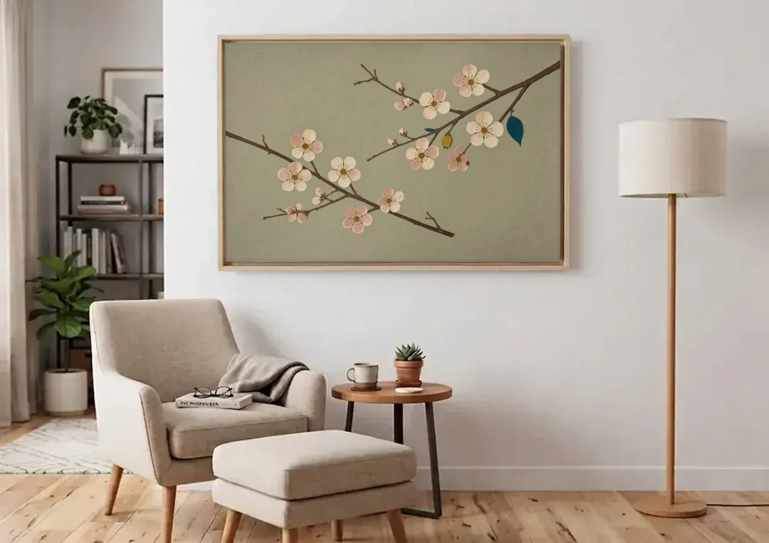 Chinoiserie Wall Art of Crossing Plum Blossom Branches canvas wall art above an armchair in a bright living room