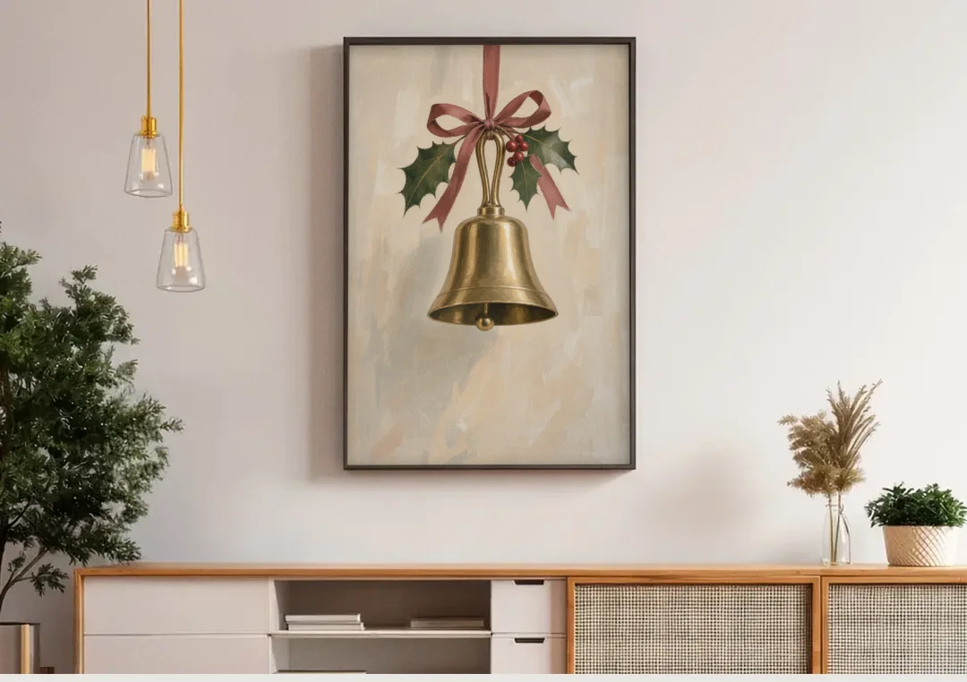 Christmas Bell Painting with Cranberry Ribbon canvas wall art above a wooden sideboard under pendant lights
