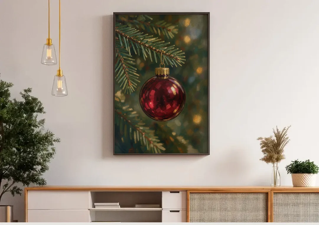 Christmas Oil Painting of a Cranberry Glass Bauble canvas wall art above a wooden sideboard under pendant lights