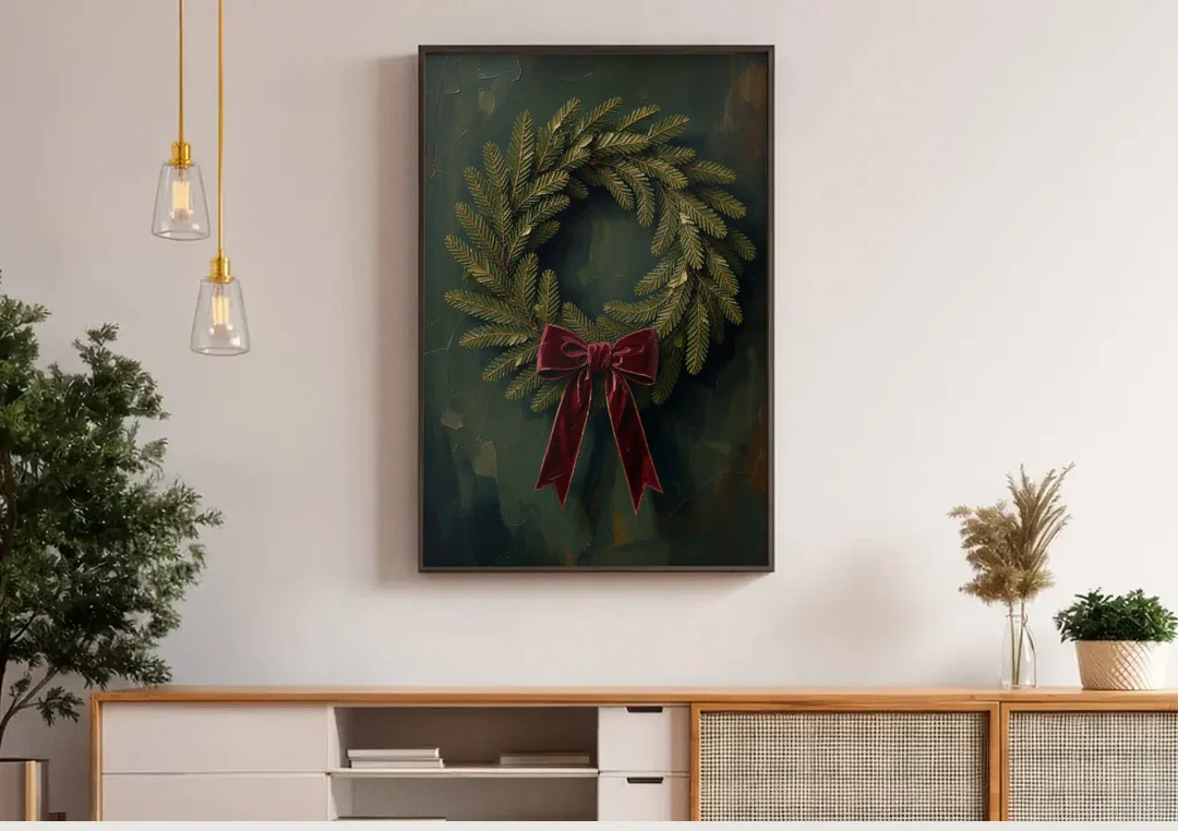 Christmas Wreath Painting with a Velvet Bow canvas wall art above a wooden sideboard under pendant lights
