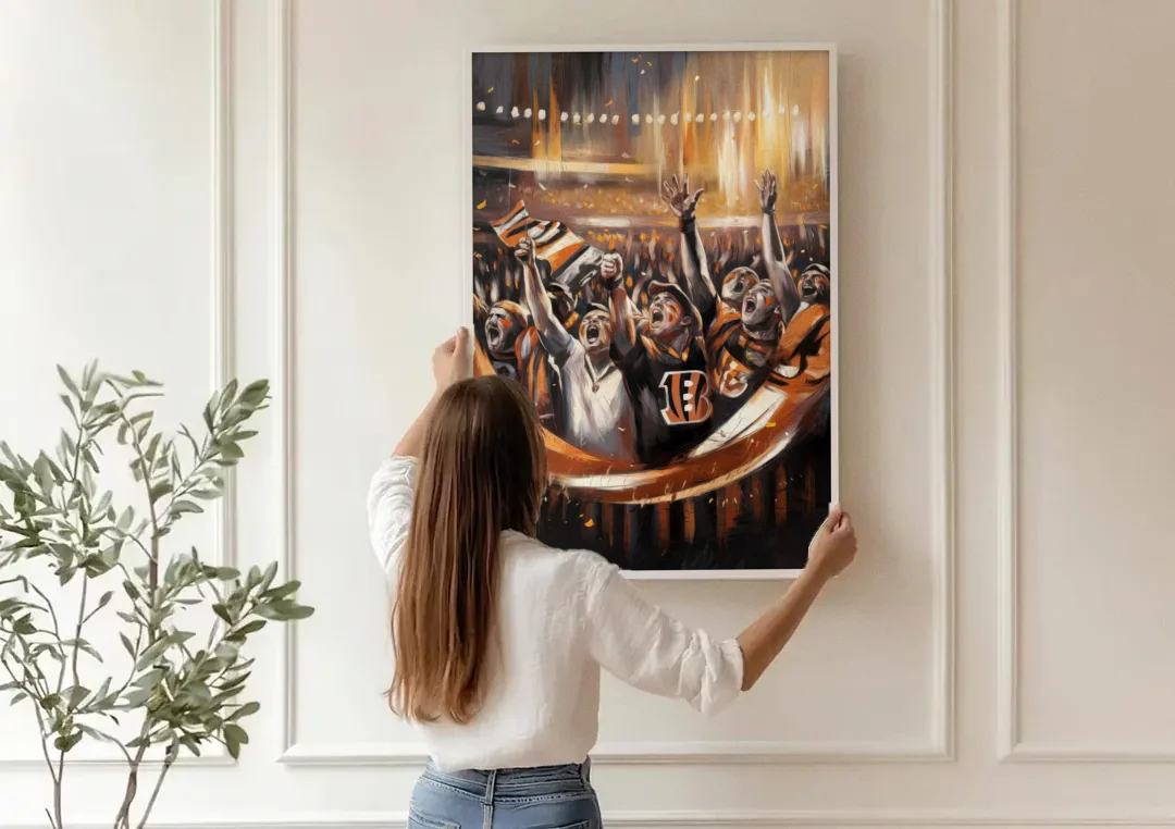 Cincinnati Bengals Fans in Action canvas wall art being hung on a paneled wall