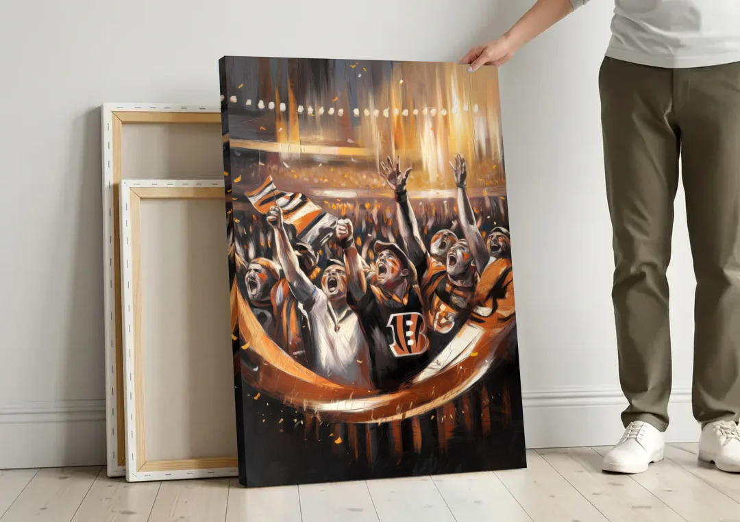 Cincinnati Bengals Fans in Action canvas wall art leaning against a wall next to blank canvases