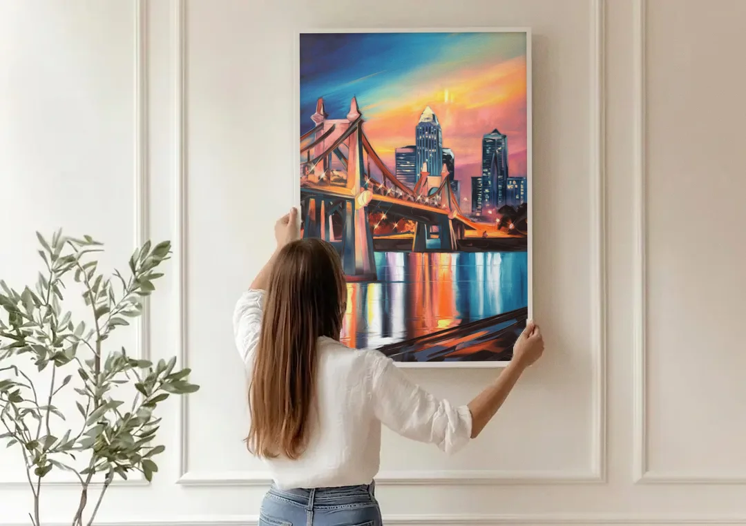 Cincinnati Skyline and Historic Bridges canvas wall art being hung on a paneled wall
