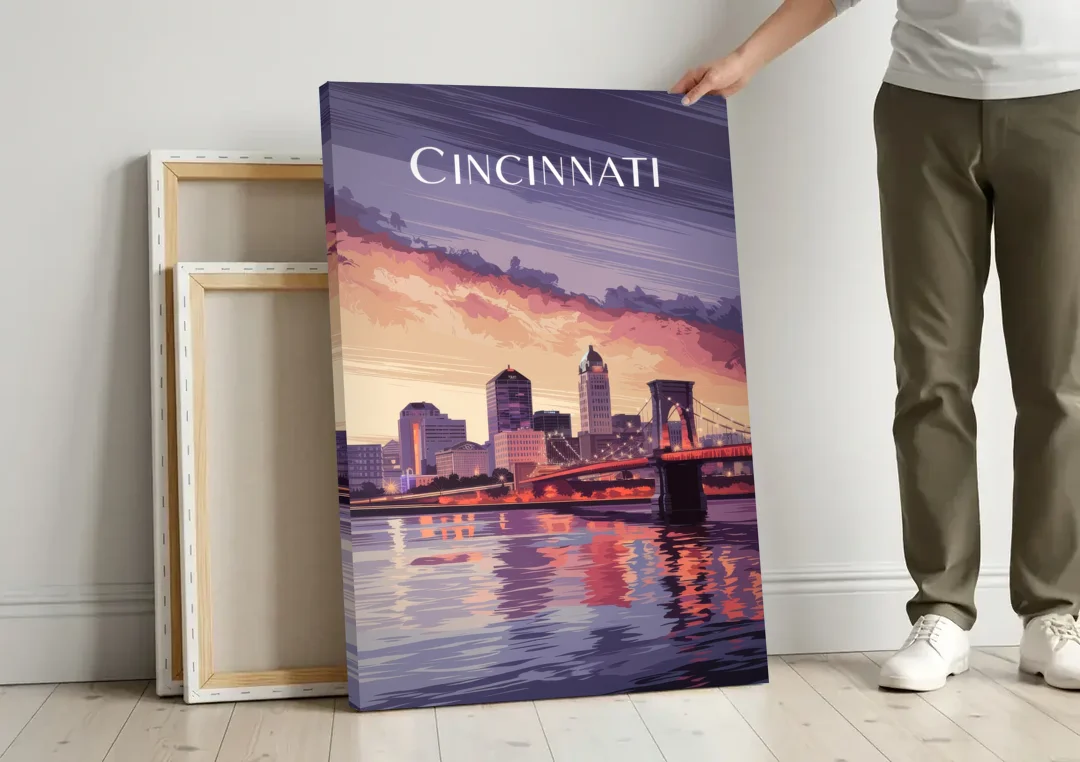 Cincinnati Skyline Over the Ohio River canvas wall art leaning against a wall next to blank canvases