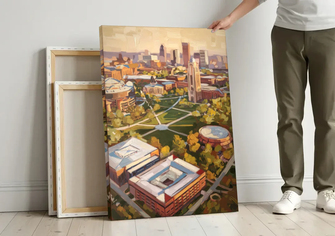 Cincinnati University Campus Highlights canvas wall art leaning against a wall next to blank canvases