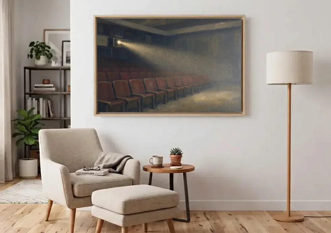Cinema Wall Art Projector Beam Over Empty Seats canvas wall art above an armchair in a bright living room