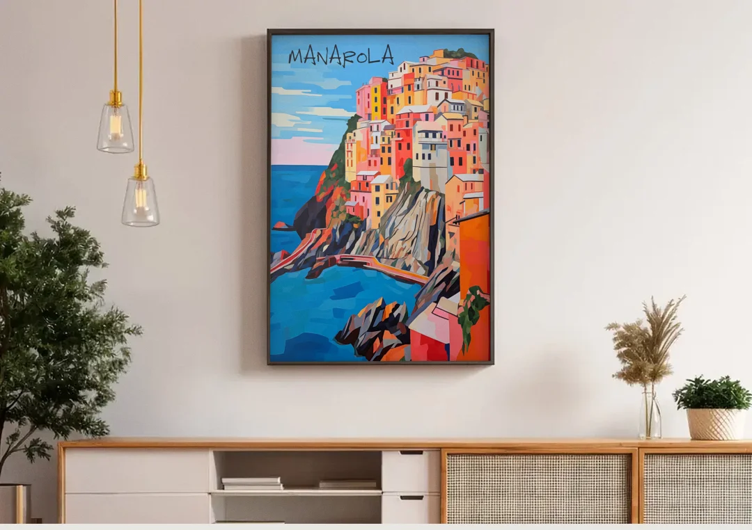 Cinque Terre Art of Manarola canvas wall art above a wooden sideboard under pendant lights