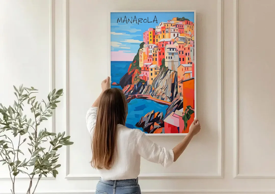 Cinque Terre Art of Manarola canvas wall art being hung on a paneled wall