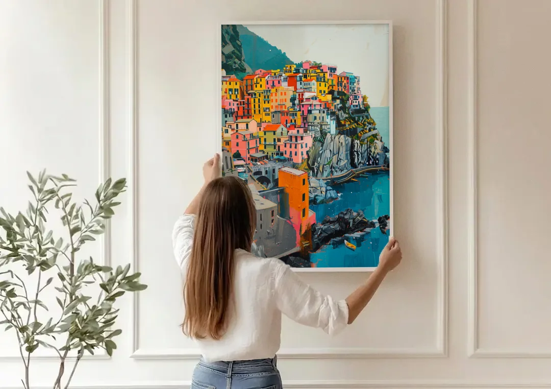 Cinque Terre Painting of a Cliff Village canvas wall art being hung on a paneled wall
