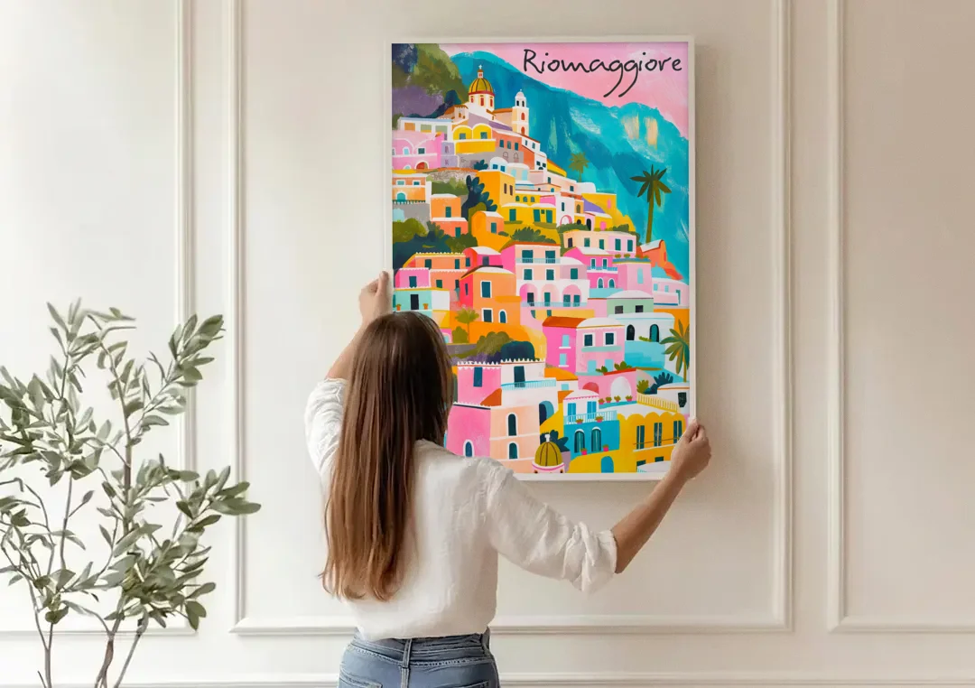 Cinque Terre Wall Art in Candy Colors canvas wall art being hung on a paneled wall