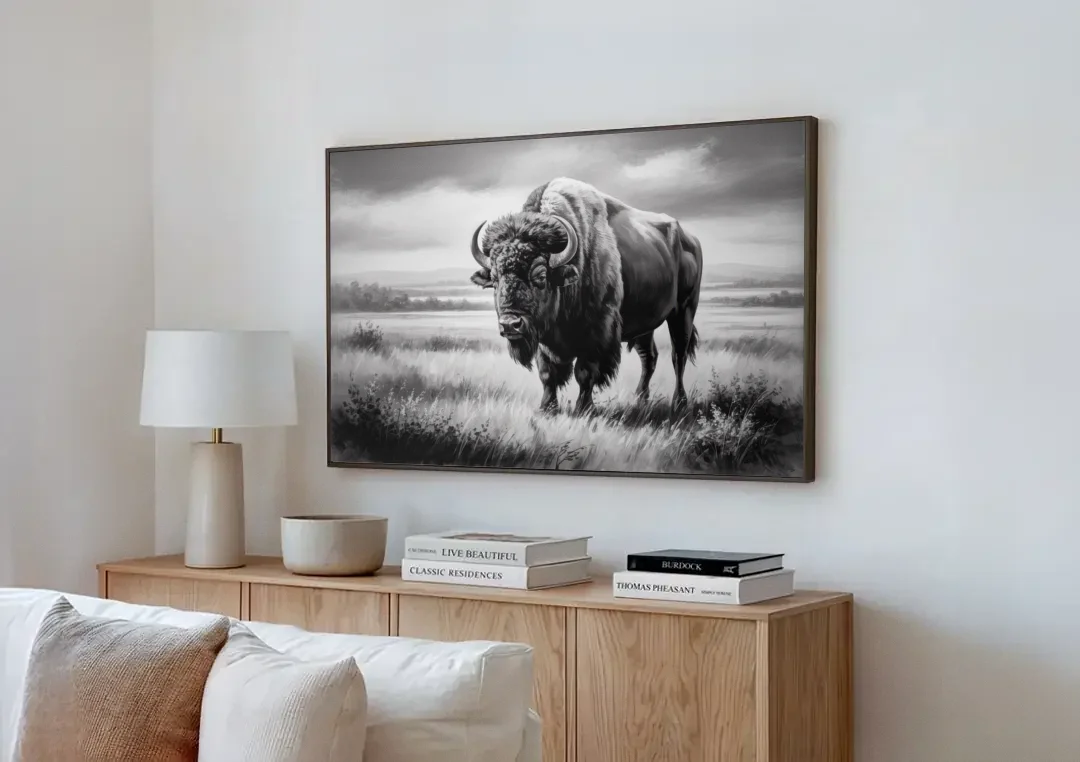 Classic Black and White Buffalo canvas wall art above a wooden sideboard next to a sofa