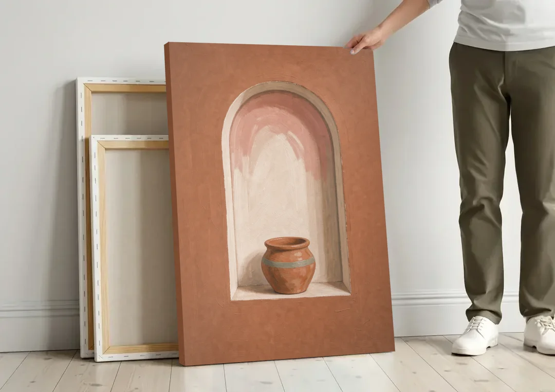 Clay Pot in a Terracotta Arched Niche canvas wall art leaning against a wall next to blank canvases