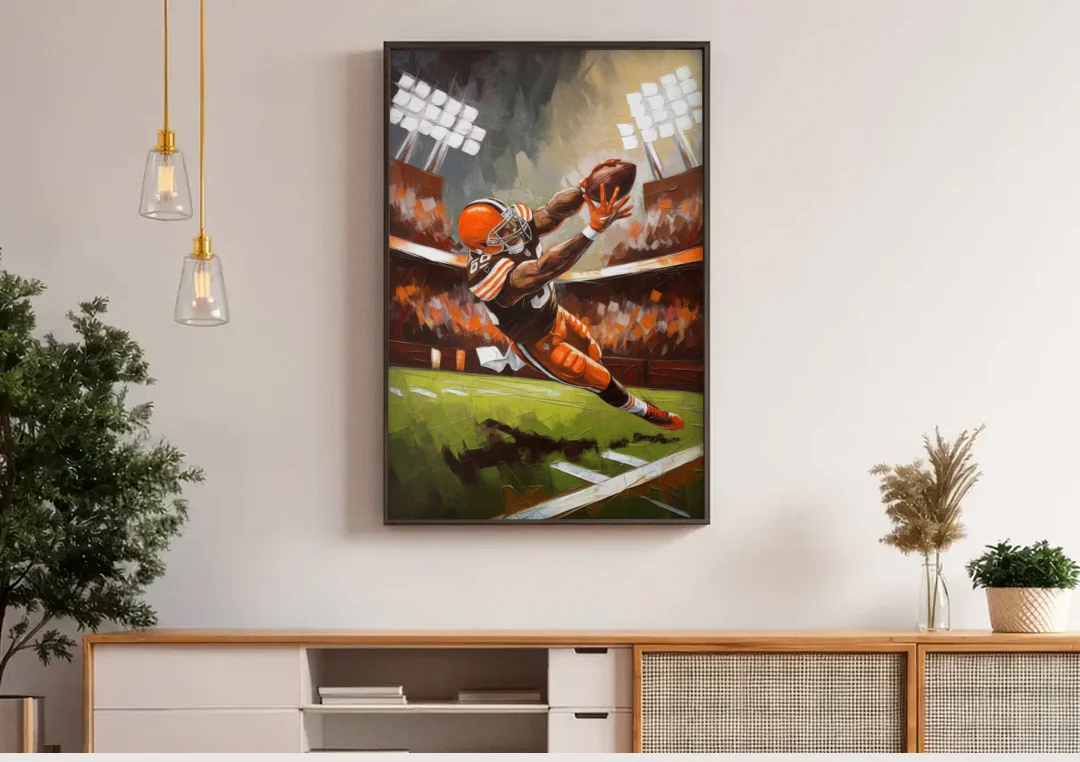 Cleveland Browns Fans in Action canvas wall art above a wooden sideboard under pendant lights