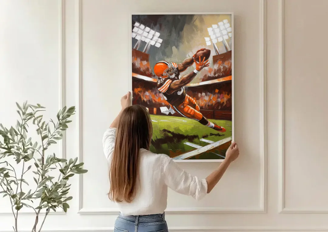Cleveland Browns Fans in Action canvas wall art being hung on a paneled wall