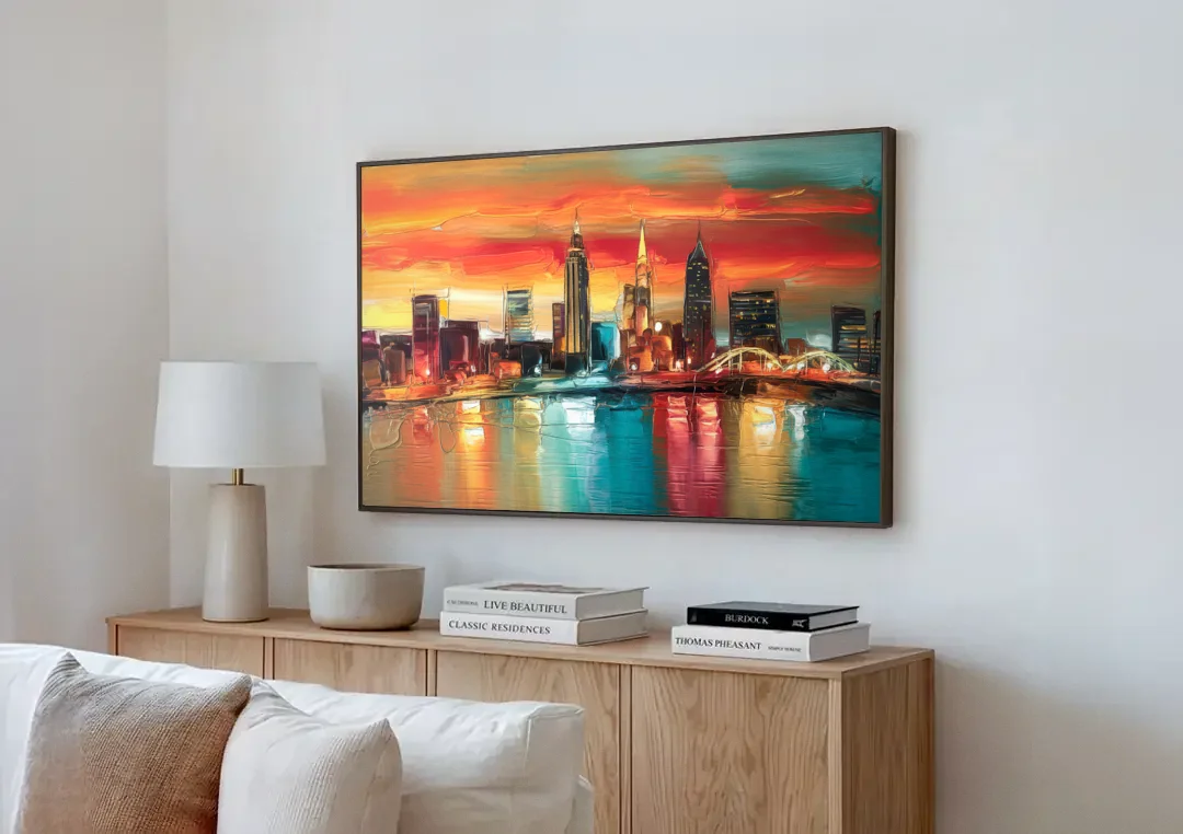 Cleveland Historic Landmarks Watercolor canvas wall art above a wooden sideboard next to a sofa