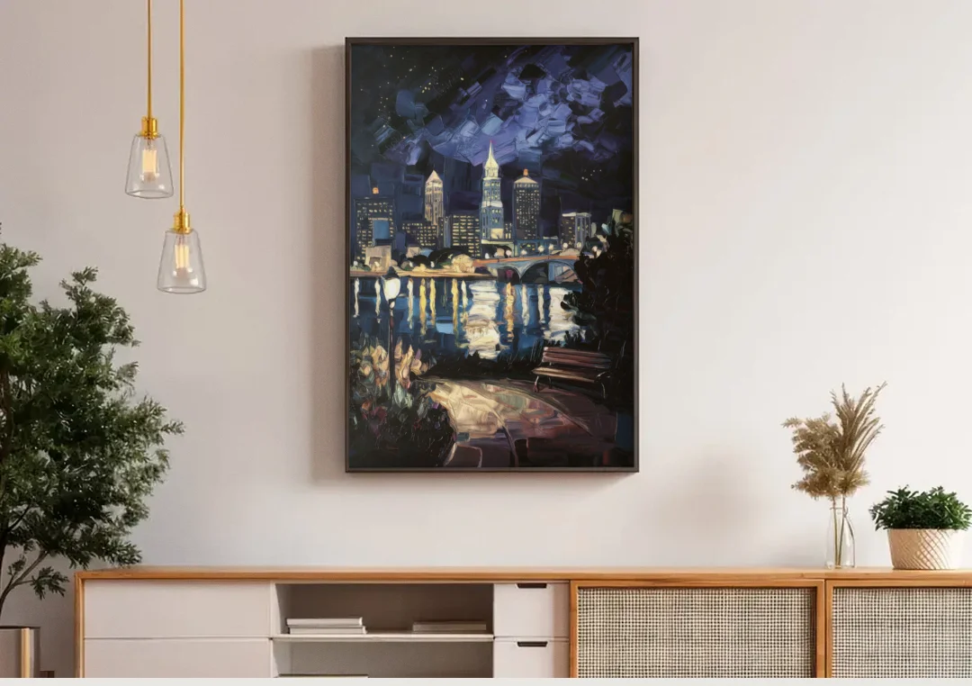 Cleveland Nighttime Lights canvas wall art above a wooden sideboard under pendant lights