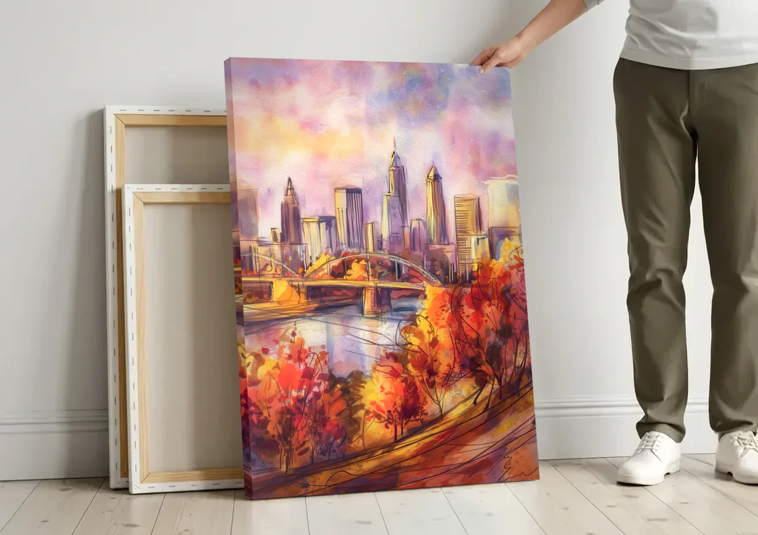 Cleveland Skyline in Autumn canvas wall art leaning against a wall next to blank canvases