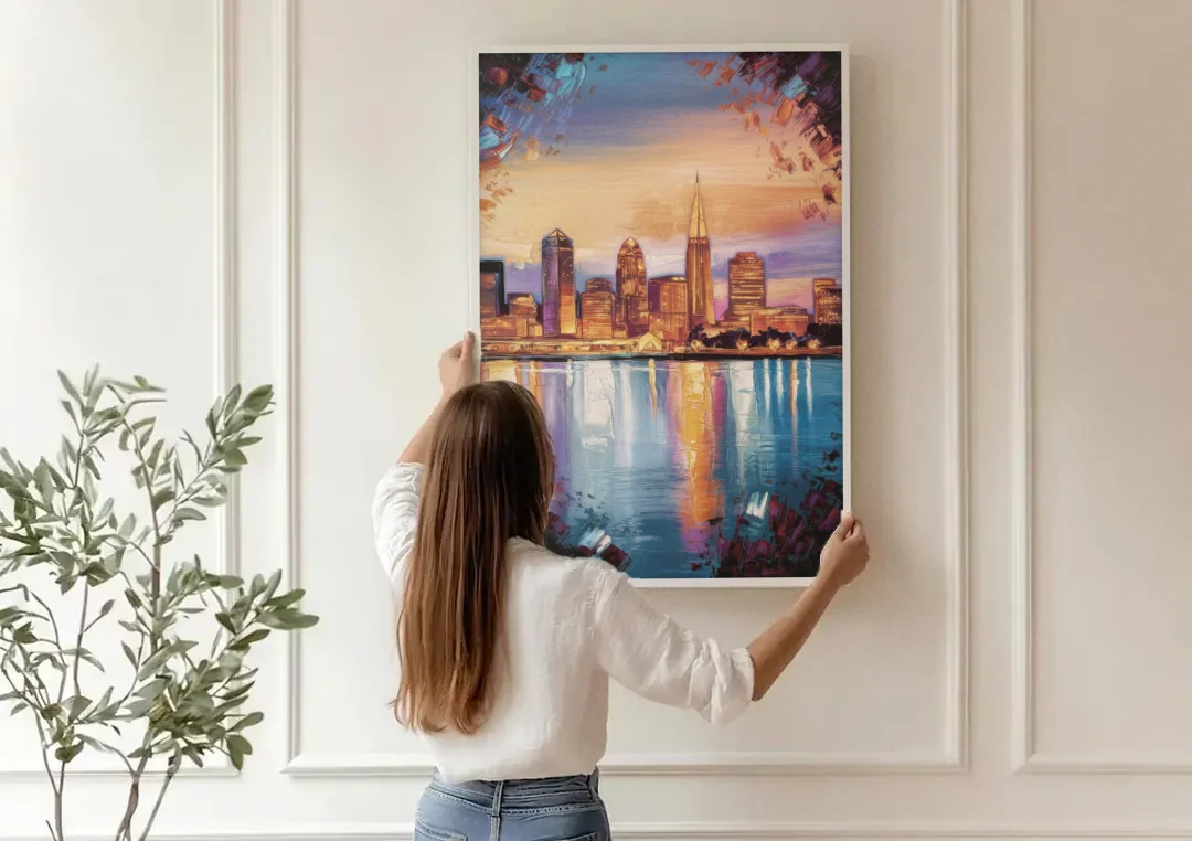 Cleveland Skyline Reflection canvas wall art being hung on a paneled wall