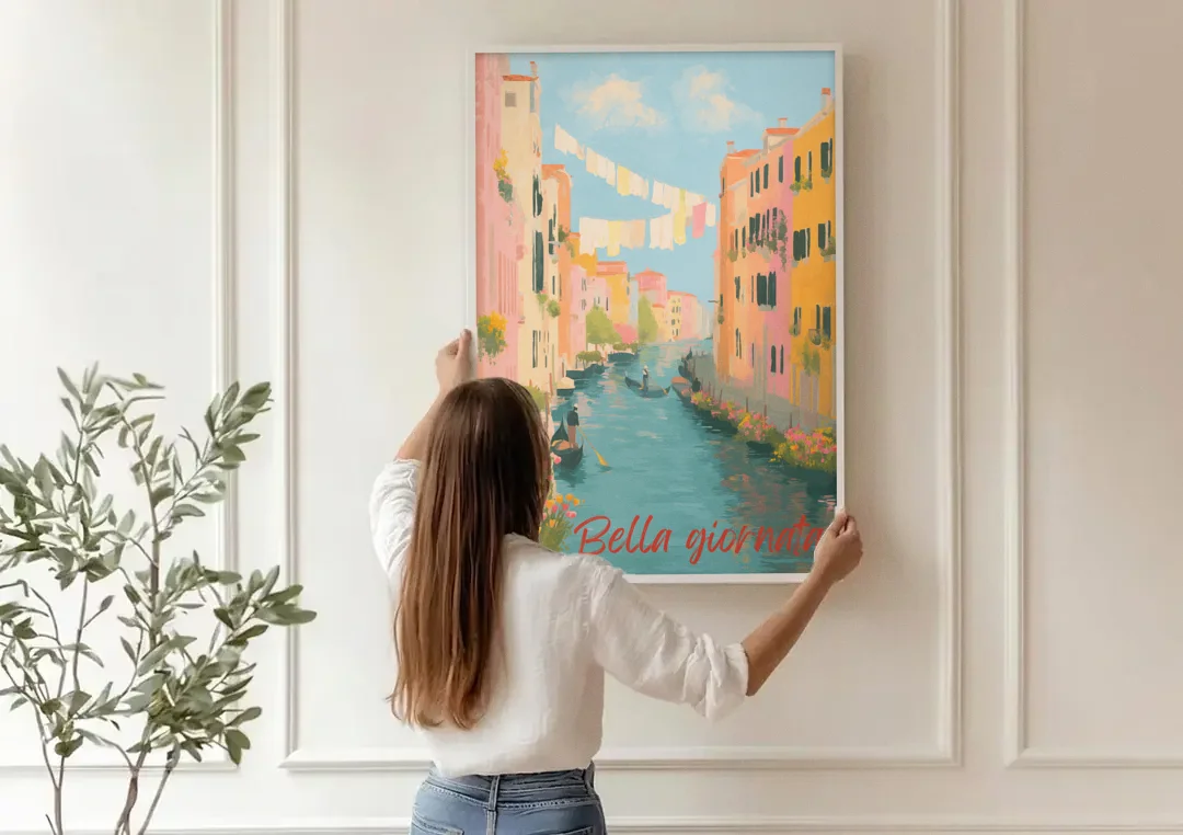 Clothesline Painting Over a Venice Canal canvas wall art being hung on a paneled wall