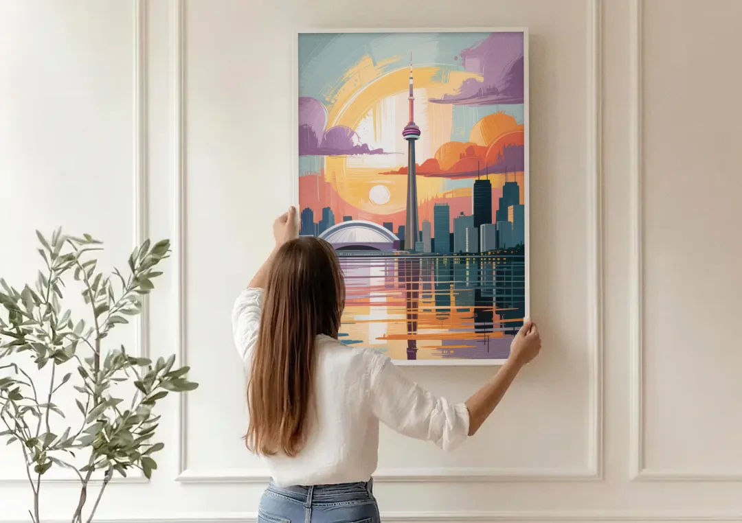 CN Tower Sunset canvas wall art being hung on a paneled wall
