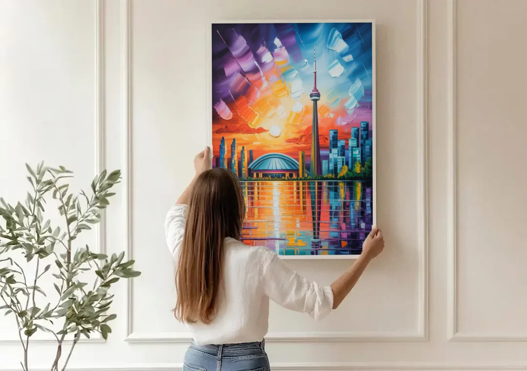 CN Tower Sunset Watercolor canvas wall art being hung on a paneled wall