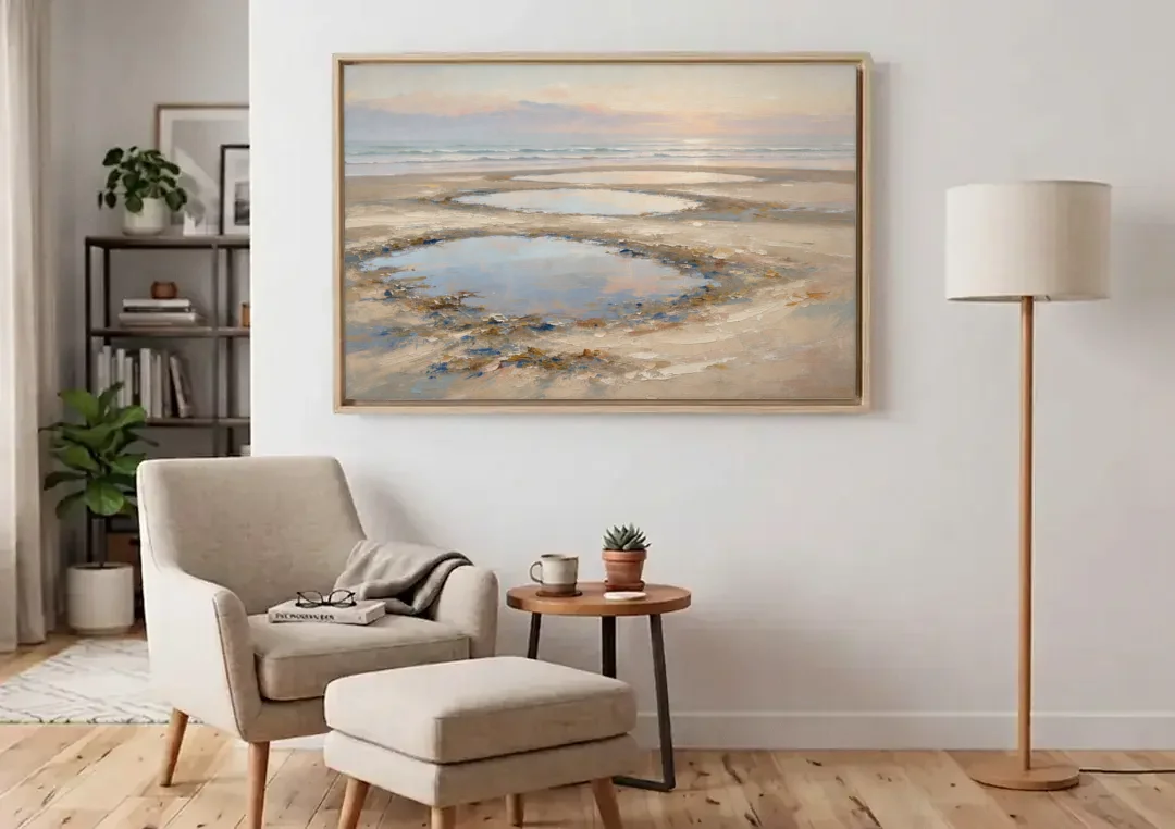 Coastal Bedroom Decor with Dawn Tide Pools canvas wall art above an armchair in a bright living room