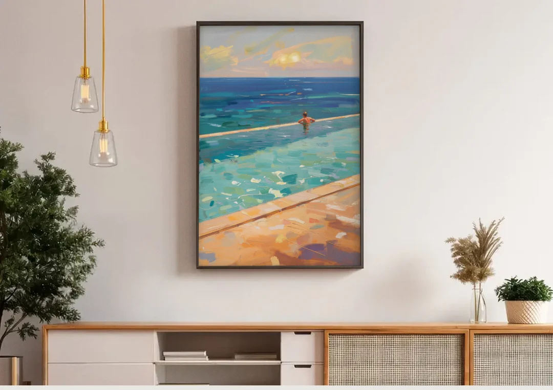 Coastal Modern Wall Art of an Infinity Pool Swimmer canvas wall art above a wooden sideboard under pendant lights