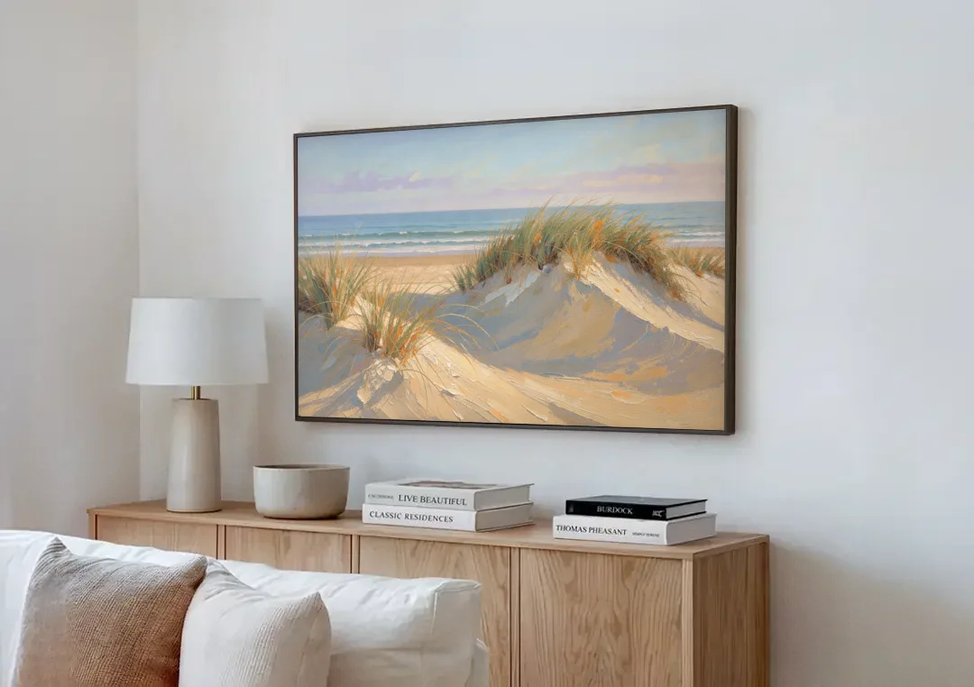 Coastal Paintings of Sea Grass Dunes canvas wall art above a wooden sideboard next to a sofa