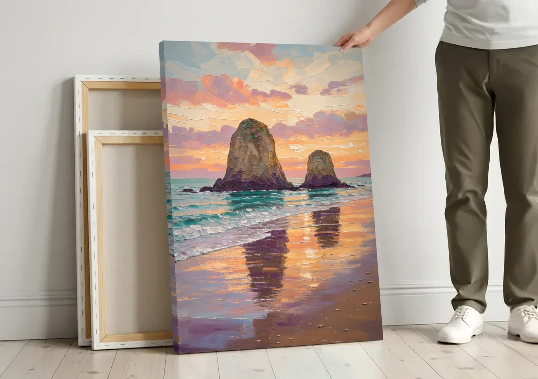 Coastal Sea Stacks at Sunset canvas wall art leaning against a wall next to blank canvases