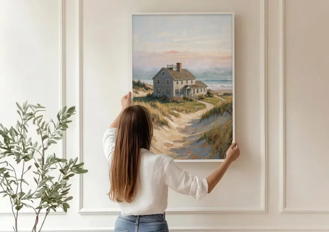 Coastal Wall Art for Living Room with Foggy Saltbox canvas wall art being hung on a paneled wall