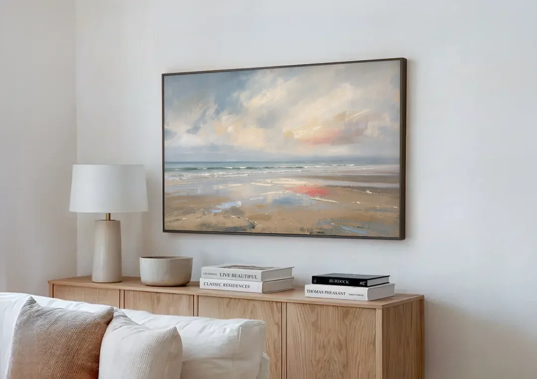 Coastal Wall Art of a Misty Low Tide Shore canvas wall art above a wooden sideboard next to a sofa