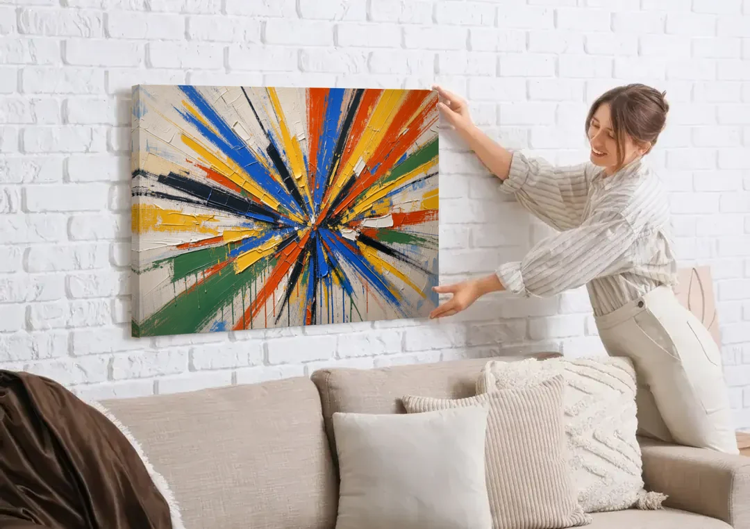 Cobalt Starburst Statement for the Living Room canvas wall art being hung on a white brick wall above a sofa