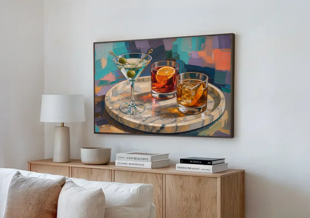 Cocktail Painting on a Marble Tray canvas wall art above a wooden sideboard next to a sofa