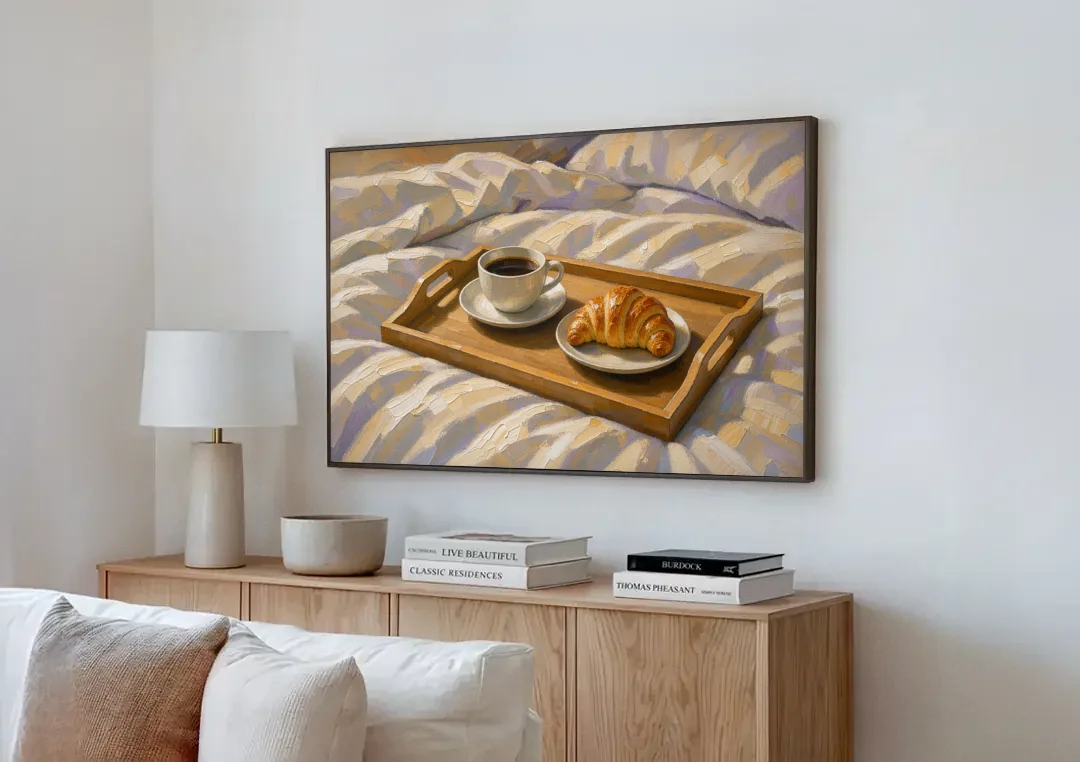 Coffee and Croissant Painting on a Breakfast Tray canvas wall art above a wooden sideboard next to a sofa