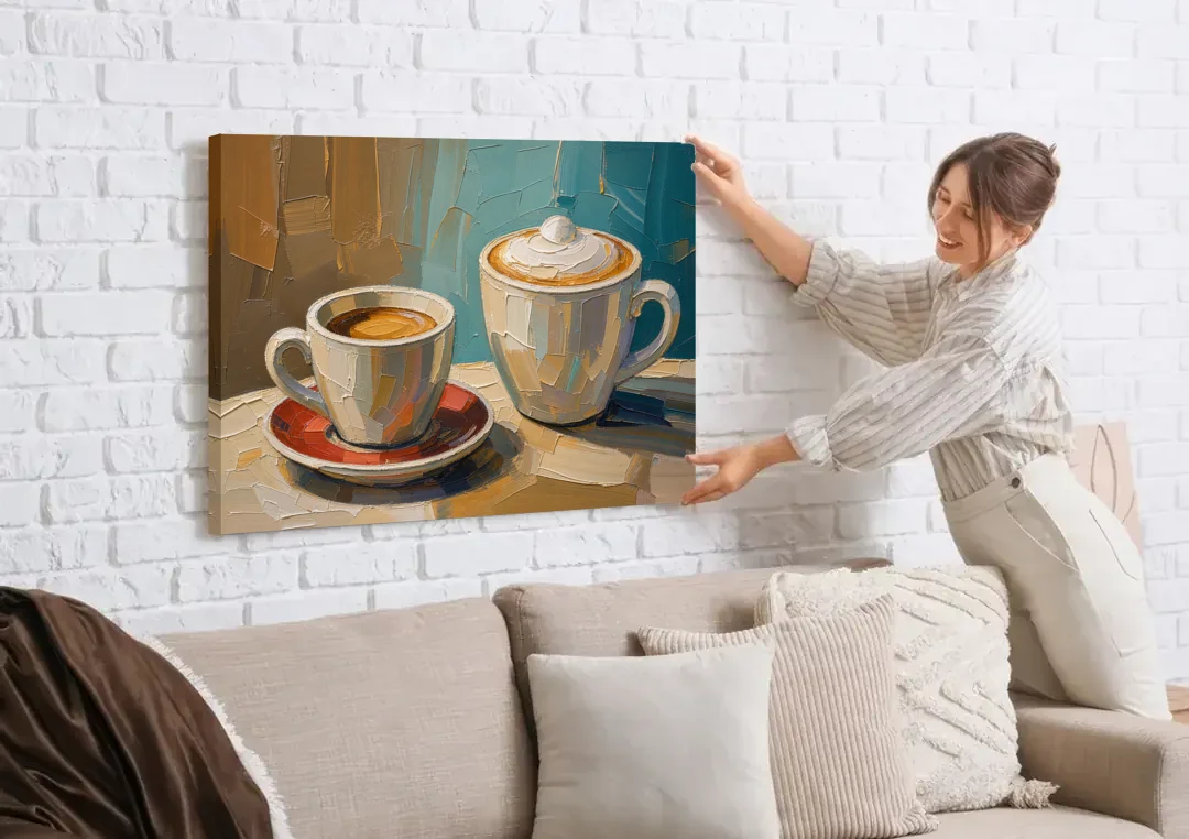 Coffee Still Life Painting Espresso and Cappuccino Duo canvas wall art being hung on a white brick wall above a sofa