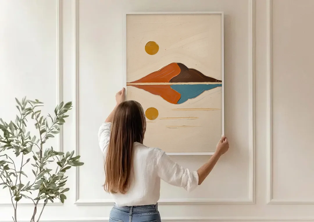 Color Block Painting of a Mirrored Terracotta Mountain canvas wall art being hung on a paneled wall