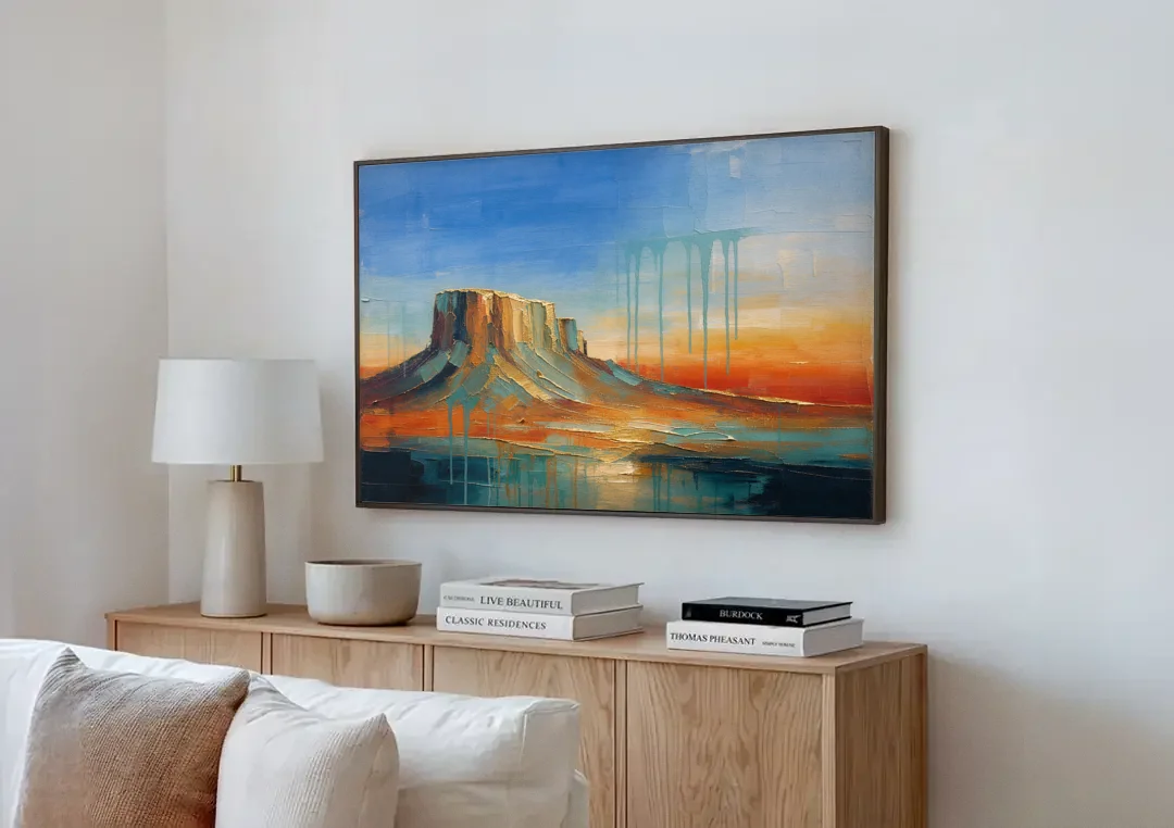 Color Field Painting with Dripping Desert Mesa canvas wall art above a wooden sideboard next to a sofa
