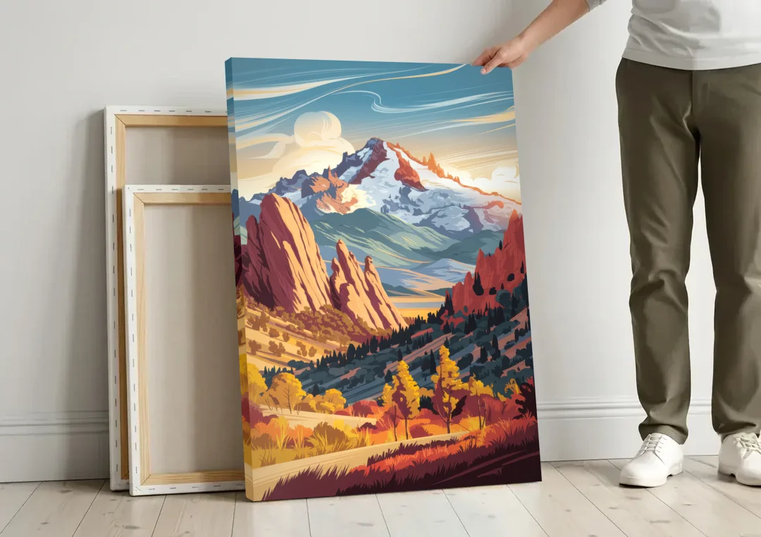 Colorado Springs Pikes Peak Panorama canvas wall art leaning against a wall next to blank canvases