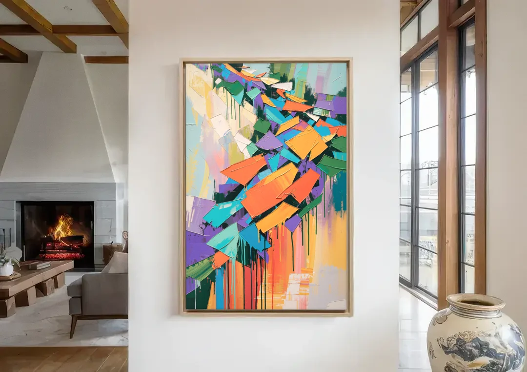 Colorful Abstract Tumbling Color Shards canvas wall art in a living room with a fireplace