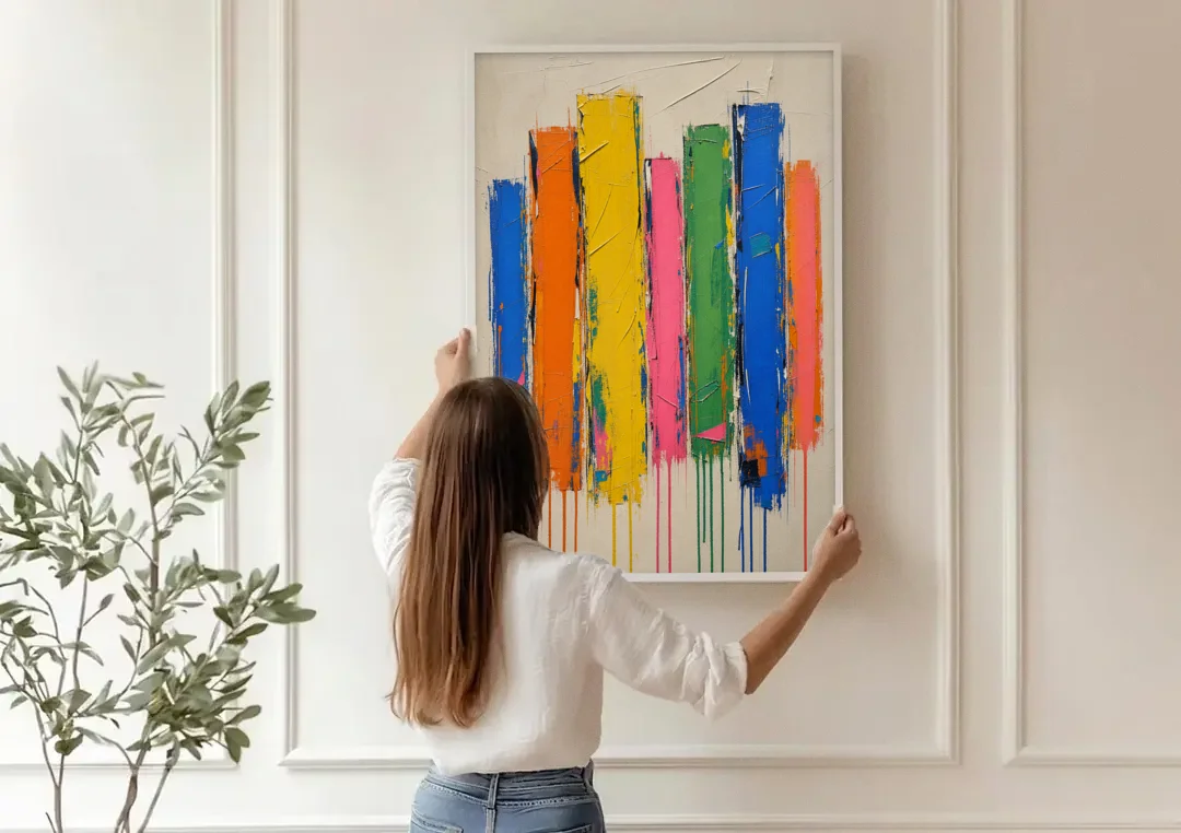 Colorful Art for the Living Room with Dripping Bars canvas wall art being hung on a paneled wall