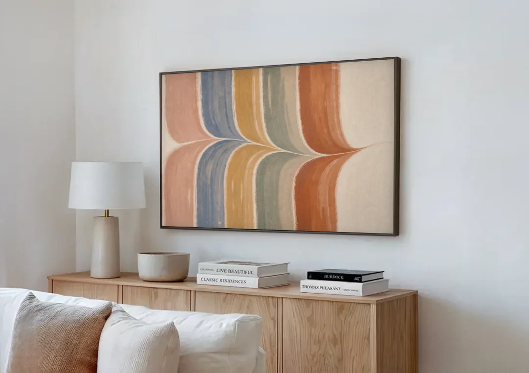 Colorful Boho Wall Art with a Gentle Stripe Wave canvas wall art above a wooden sideboard next to a sofa