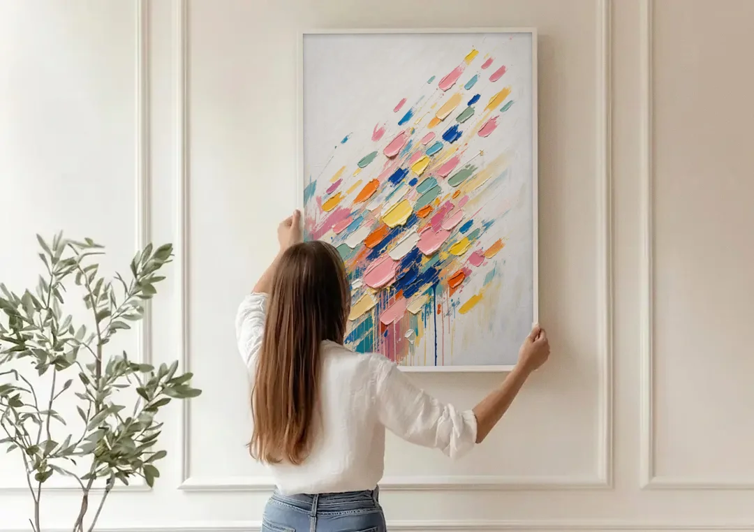 Colorful Canvas Wall Art of Confetti Strokes in Flight canvas wall art being hung on a paneled wall