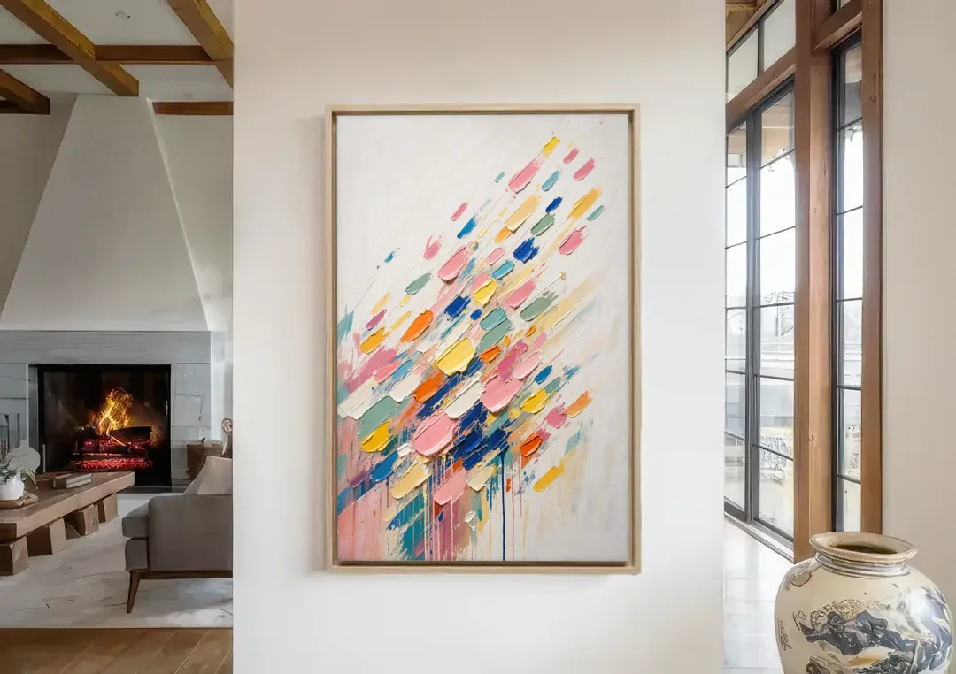 Colorful Canvas Wall Art of Confetti Strokes in Flight canvas wall art in a living room with a fireplace