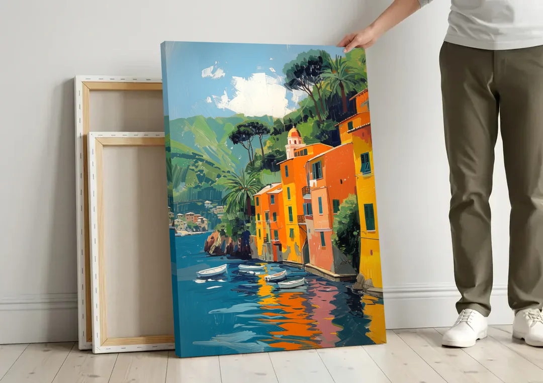 Colorful Houses Painting of Portofino canvas wall art leaning against a wall next to blank canvases